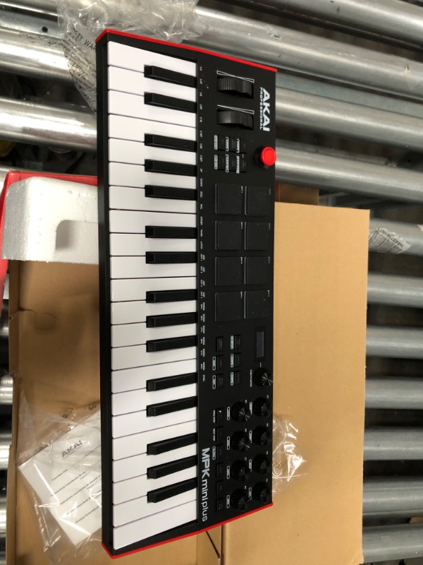 Photo 2 of Akai Professional MPK Mini Plus - USB MIDI Keyboard Controller with 37 Mini Keys, 8 MPC Pads, Sequencer, MIDI/CV/Gate I/O, Music Production Software
