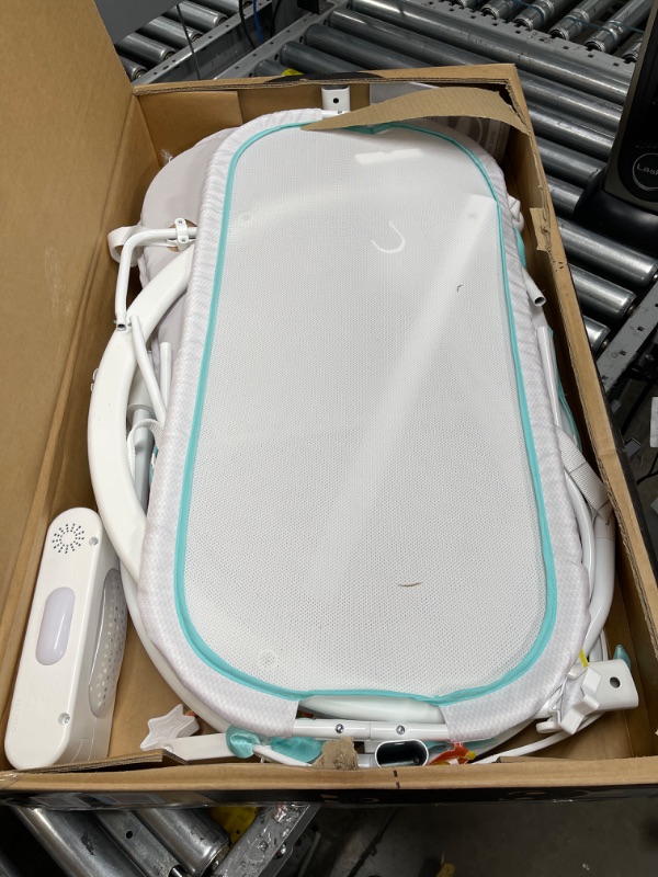 Photo 1 of Fisher-Price Soothing Motions Bassinet Windmill, Baby Cradle with sway Motion, Light Projection, Overhead Mobile, Vibrations and Music Windmill - Frustration Free Packaging