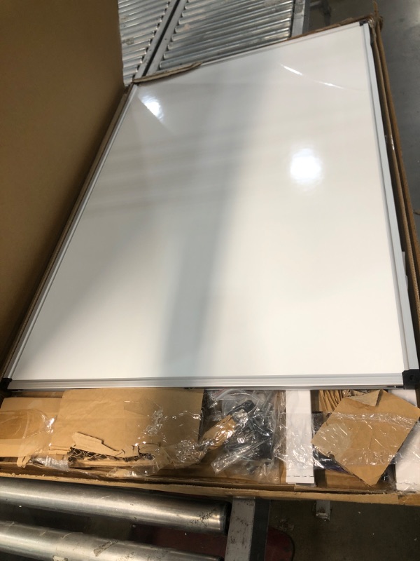 Photo 2 of **MINOR DAMAGE** Rolling Whiteboard Dry Erase Board on Wheels with Stand 48x32" Large, Portable, Double Sided Mobile Whiteboard on Wheels with Magnetic Eraser, Ruler, 2 Gridding Tapes, 12 Pin Magnets for Home Office 48" x 32" inches