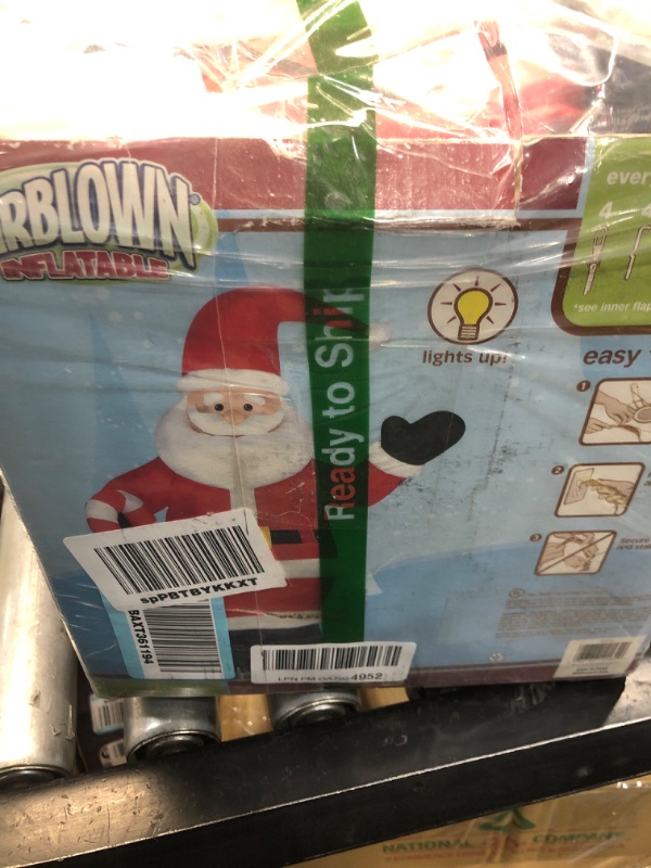 Photo 1 of 8 Ft. - Gemmy Christmas Airblown Inflatable - Santa holding Candy Cane Yard Art - OPP