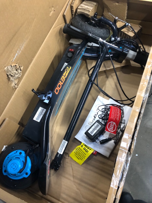 Photo 2 of Razor E100 Kids Ride On 24V Motorized Powered Electric Kick Scooter Toy, Speeds up to 10 MPH with Brakes, and Pneumatic Tires for Kids Ages 8+
