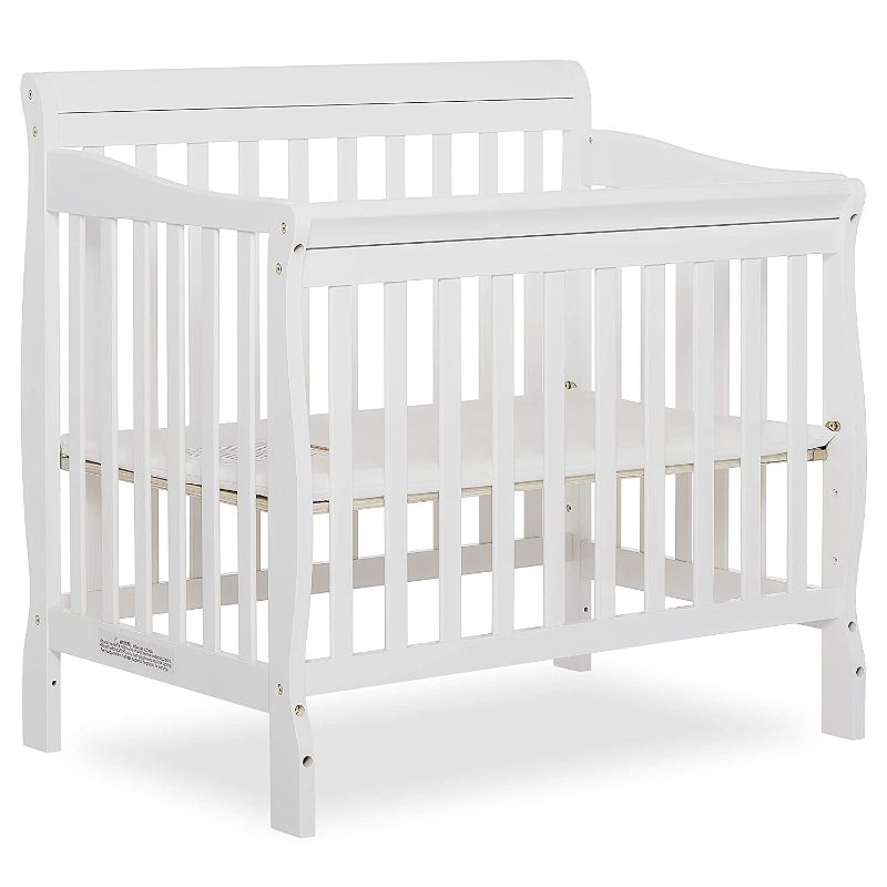 Photo 1 of Dream On Me Aden 4-in-1 Convertible Mini Crib In Black, Greenguard Gold Certified, Non-Toxic Finish, New Zealand Pinewood, With 3 Mattress Height Settings
