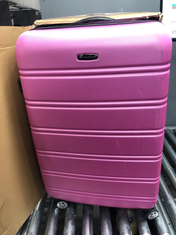 Photo 1 of Rockland Melbourne Hardside Expandable Spinner Wheel Luggage, Pink, 3-Piece Set (20/24/28)
