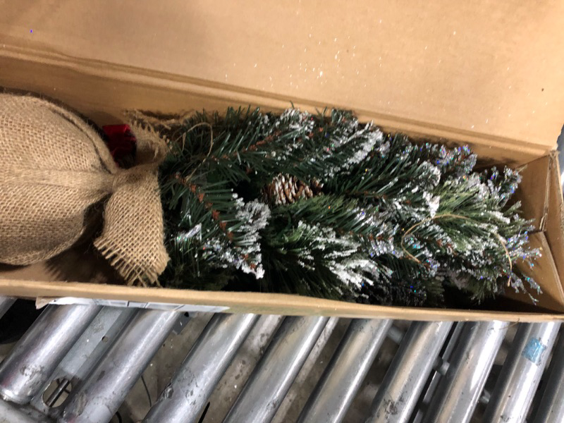 Photo 1 of National Tree Company Pre-lit Artificial Mini Christmas Tree | Includes Small LED Lights, White Tipped, Glitter Branches Cones and Cloth Bag Base | Glittery Bristle Pine-2, 2 Foot, Green