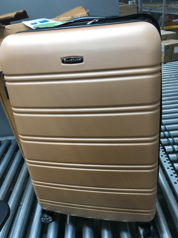 Photo 1 of Rockland Melbourne Hardside Expandable Spinner Wheel Luggage, Champagne 1-peice 