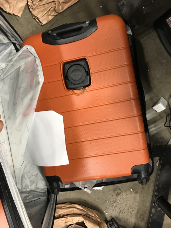 Photo 3 of *** Damage to both smaller bags and a scratch on the bigger bag in the back *** Wrangler Smart Luggage Set with Cup Holder and USB Port, Burnt Orange, 3 Piece 3 Piece Set Burnt Orange