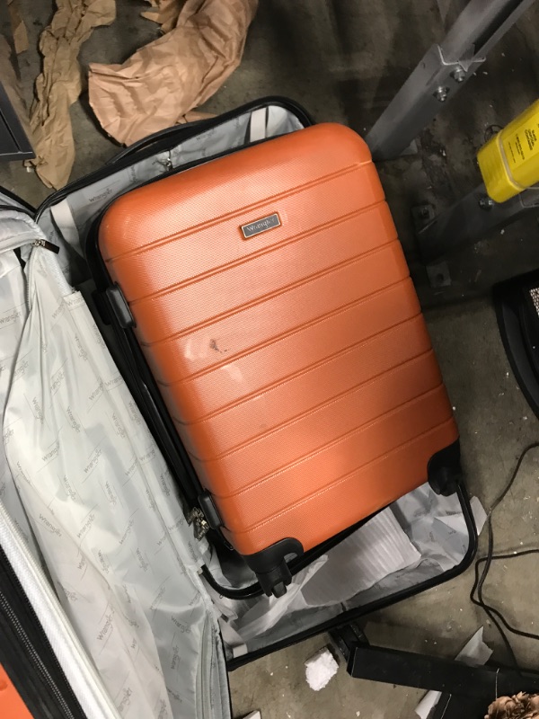 Photo 4 of *** Damage to both smaller bags and a scratch on the bigger bag in the back *** Wrangler Smart Luggage Set with Cup Holder and USB Port, Burnt Orange, 3 Piece 3 Piece Set Burnt Orange