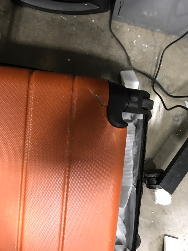 Photo 5 of *** Damage to both smaller bags and a scratch on the bigger bag in the back *** Wrangler Smart Luggage Set with Cup Holder and USB Port, Burnt Orange, 3 Piece 3 Piece Set Burnt Orange