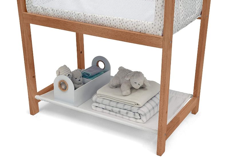 Photo 1 of Delta Children Classic Wood Bedside Bassinet Sleeper Portable Crib with HighEnd Wood Frame, Paint Dabs