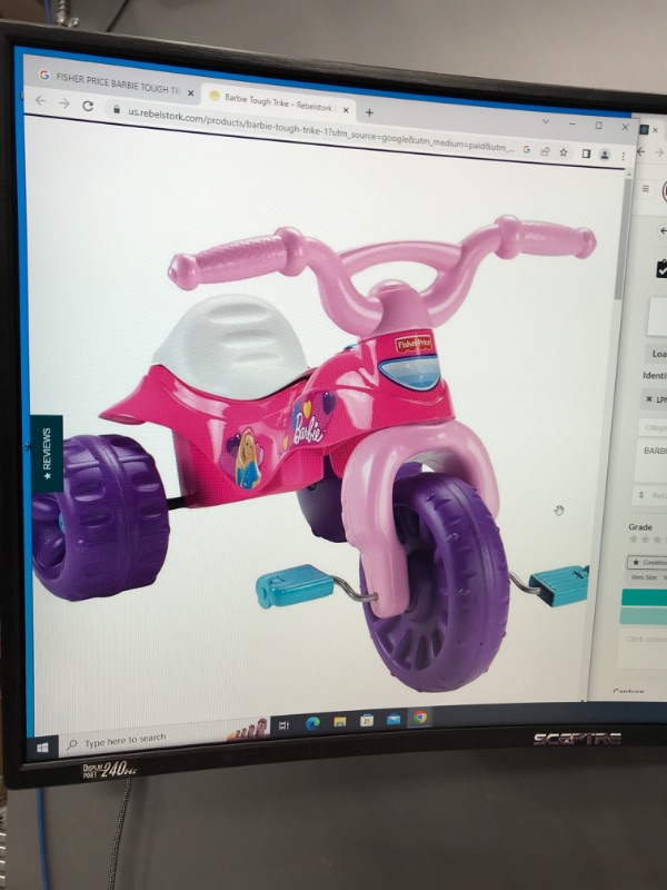 Photo 1 of BARBIE TOUGH TRIKE
