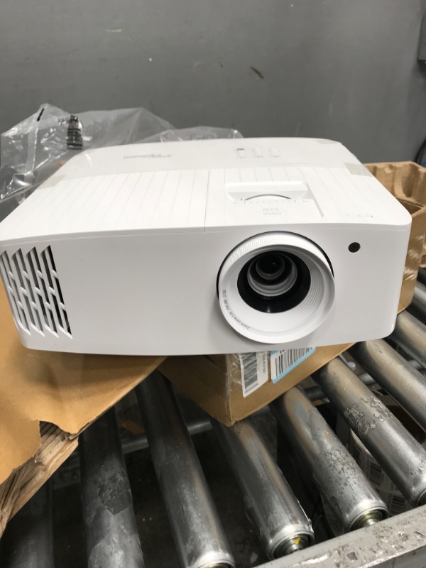 Photo 2 of Optoma UHD38x Bright, True 4K UHD Gaming Projector | 4000 Lumens | 4.2ms Response Time at 1080p with Enhanced Gaming Mode | Lowest Input Lag on 4K Projector | 240Hz Refresh Rate | HDR10 & HLG
NEEDS REPAIRS