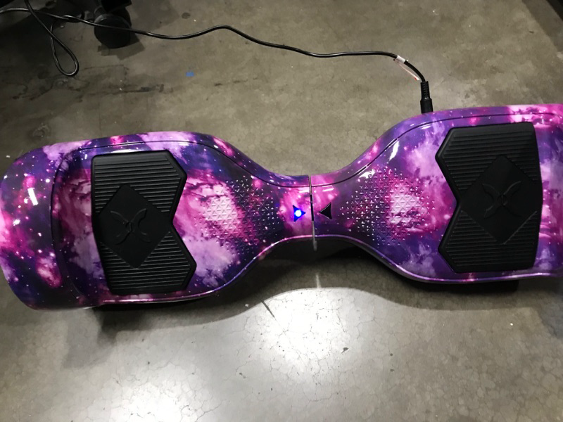 Photo 1 of *TURNS ON BUT DOES NOT FUNCTION* Hover-1 Helix Electric Hoverboard | 7MPH Top Speed, 4 Mile Range, 6HR Full-Charge, Built-in Bluetooth Speaker, Rider Modes: Beginner to Expert Hoverboard Galaxy
