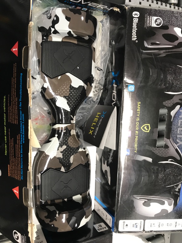 Photo 2 of ***PARTS ONLY*** Hover-1 Helix Electric Hoverboard | 7MPH Top Speed, 4 Mile Range, 6HR Full-Charge, Built-in Bluetooth Speaker, Rider Modes: Beginner to Expert Hoverboard Camo
