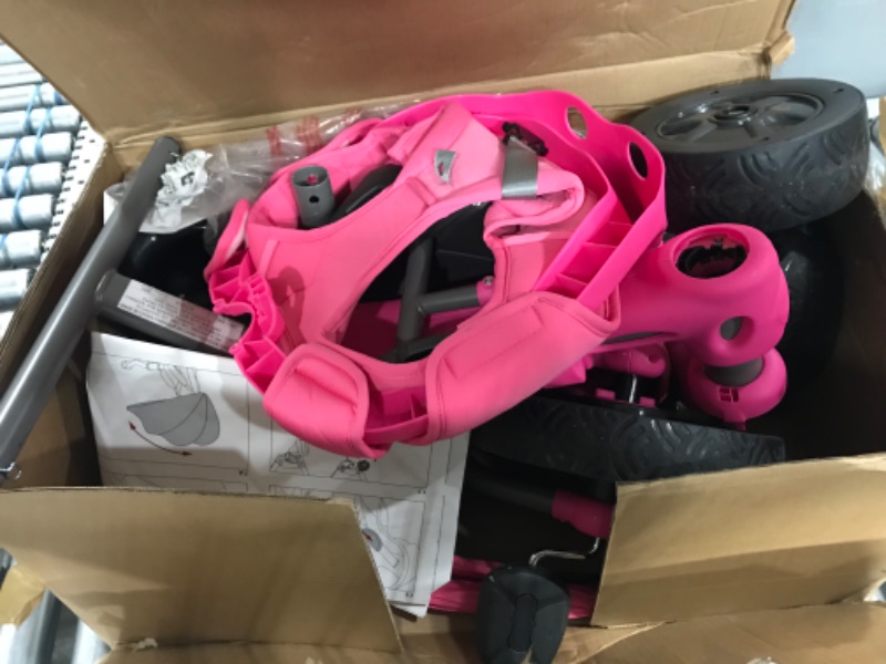 Photo 2 of Joovy 4.1 Kids Tricycle with 4-Stages Featuring Extra-Wide Front Tire, Removable and Adjustable Parent Handle, Safety Harness, Machine-Washable Seat Pad, and Retractable Canopy (Pink)
