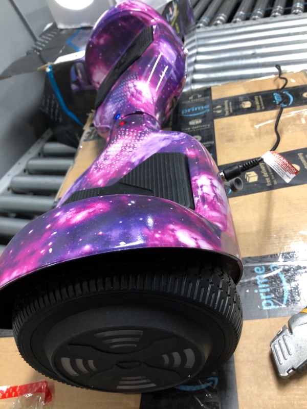 Photo 2 of **DAMAGE TO CHARGING PORT**
 Hover-1 Helix UL Certified Electric Hover Board with 6.5 in. LED Wheels LED Sensor Lights Bluetooth Speaker; Lithium-ion 10 Cell Battery Ideal for
