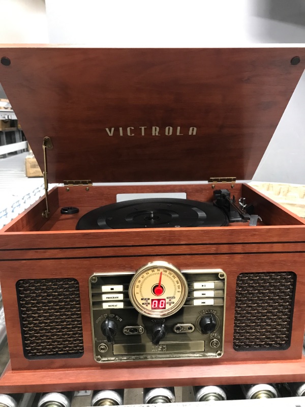 Photo 2 of Victrola Nostalgic 6-in-1 Bluetooth Record Player & Multimedia Center with Built-in Speakers - 3-Speed Turntable, CD & Cassette Player, FM Radio | Wireless Music Streaming | Mahogany Mahogany Entertainment Center (tested)