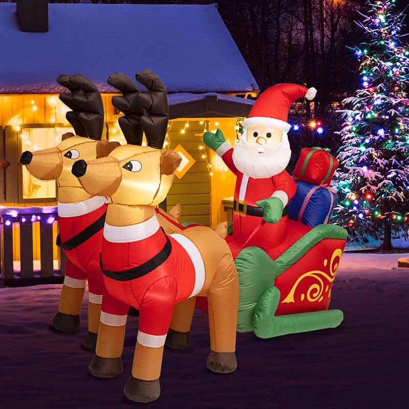 Photo 1 of 5.9FT Long Christmas Inflatables Outdoor Decorations, Inflatable Santa Claus on Sleigh with Reindeer & Gift Boxes