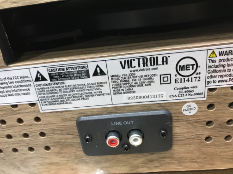 Photo 3 of damaged
tested :works 
Victrola's 4-in-1 Highland Bluetooth Record Player with 3-Speed Turntable with FM Radio (VTA-330B-FOT)