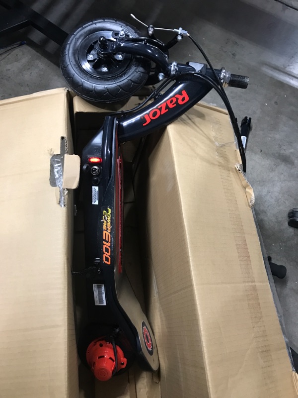 Photo 2 of *Major Damage-See Photos/Powers On* Razor Power Core E100 Electric Scooter - 100w Hub Motor, 8" Air-filled Tire, Up to 11 mph and 60 min Ride Time, for Kids Ages 8+
