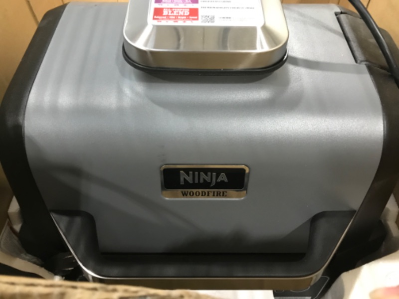 Photo 2 of ***NON FUNCTIONAL****   Ninja OG701 Woodfire Outdoor Grill, 7-in-1 Master Grill, BBQ Smoker, & Outdoor Air Fryer plus Bake, Roast, Dehydrate, & Broil, Woodfire Technology, uses Ninja Woodfire Pellets, Weather-Resistant, Grey
