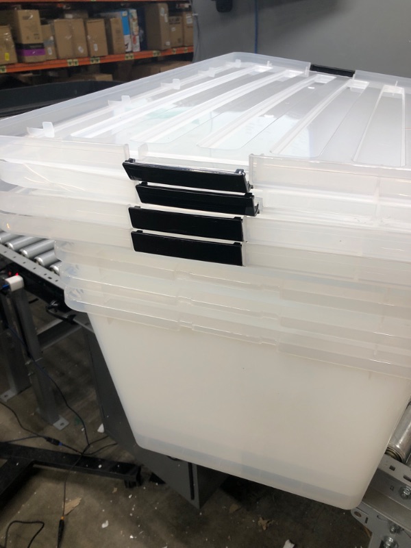 Photo 3 of 2 lid are broken 
IRIS USA 91 Quart Large Storage Bin Utility Tote Organizing Container Box with Buckle Down Lid for Clothes Storage, 4 Pack, Clear, Clear/Black (500184) h) 91 Qt. - 4 Pack