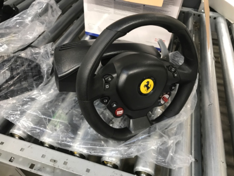 Photo 4 of *** USED *** *** SHIPPING DAMAGE TO THE GAS PEDAL ****
Thrustmaster T80 Ferrari 488 GTB Edition Racing Wheel PS4