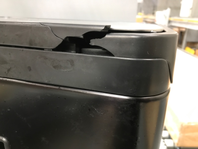 Photo 3 of **** USED **** *** SMALL SHIPPING DAMAGE LID IS STILL FUNCTIONAL***
Kohler 20940-BST Step Trash Can, 13 Gallon, Black with Stainless Steel Black Stainless Steel 13 Gallon Can