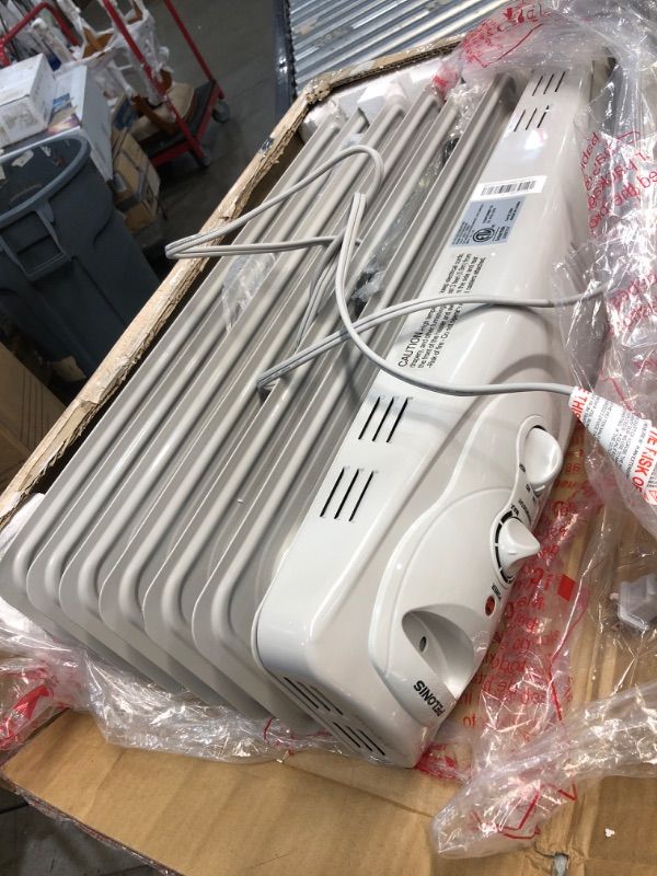 Photo 1 of PELONIS PHO15A2AGW, Basic Electric Oil Filled Radiator, 1500W Portable Full Room Radiant Space Heater with Adjustable Thermostat, White, 26.10 x 14.20 x 11.00 in