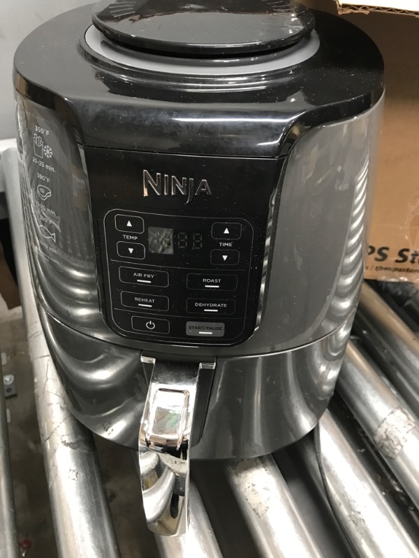 Photo 2 of *** POWERS ON *** Ninja AF101 Air Fryer that Crisps, Roasts, Reheats, & Dehydrates, for Quick, Easy Meals, 4 Quart Capacity, & High Gloss Finish, Black/Grey
