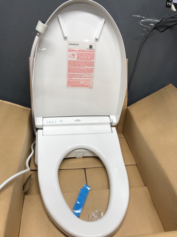 Photo 4 of *** POWERS ON *** TOTO SW3036R#01 WASHLET K300 Electronic Bidet Toilet Seat, Cotton White Cotton White Self Cleaning Wand with EWATER