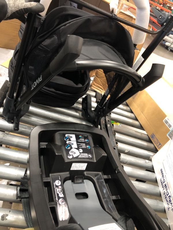 Photo 1 of Evenflo Pivot Modular Travel System With SafeMax Car Seat Only Travel System Casual Grey