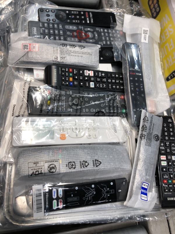 Photo 1 of 15 assorted new remotes
