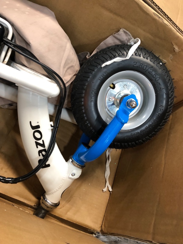 Photo 1 of **used-item**
Razor 13113614 E300 Electric Scooter- white blue
