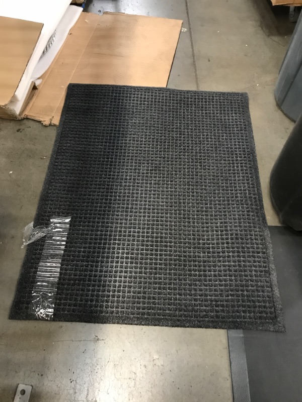 Photo 1 of 2'11"x3'8" black rug 