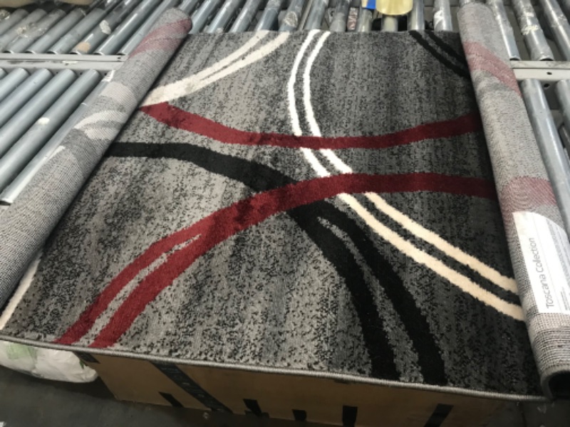 Photo 1 of 39.5"x61" black/red/grey rug 