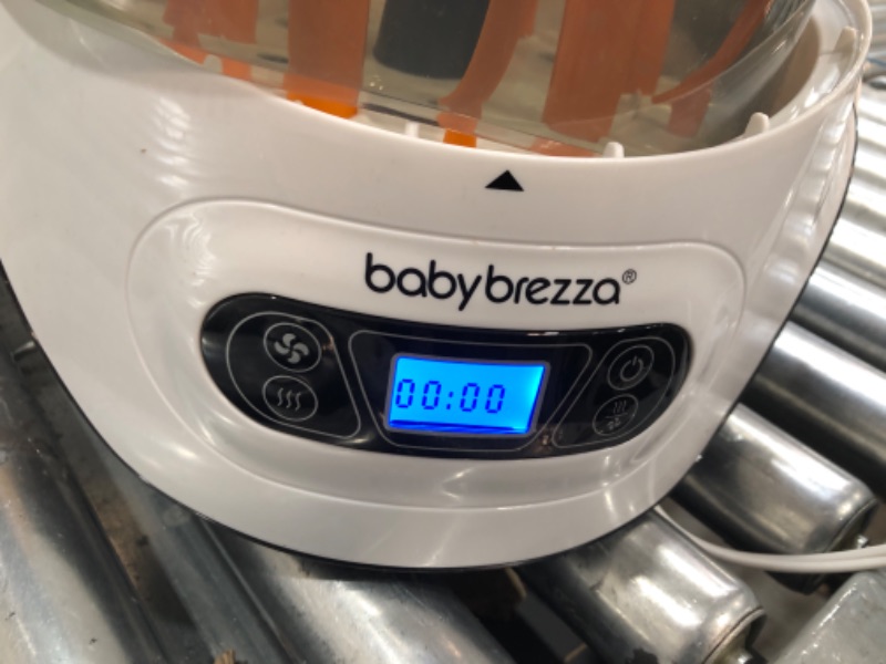 Photo 2 of Baby Brezza Baby Bottle Sterilizer and Dryer Machine – Electric Steam Sterilization - Universal Fit - Pacifiers, Glass, Plastic, and Newborn Feeding Bottlest4