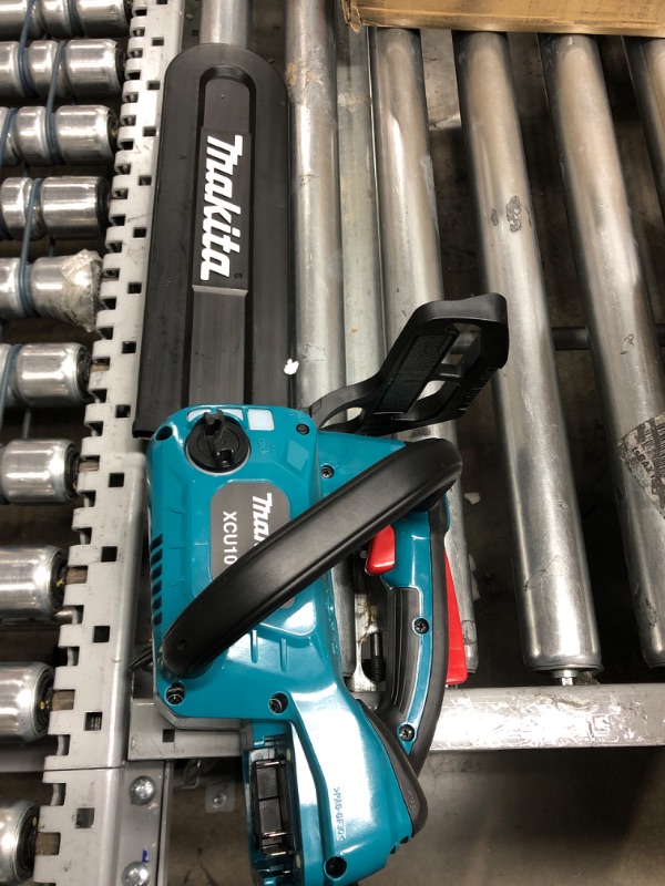 Photo 5 of *USED*Makita XCU10SM1 18V LXT® Lithium-Ion Brushless Cordless 12" Top Handle Chain Saw Kit (4.0 Ah)