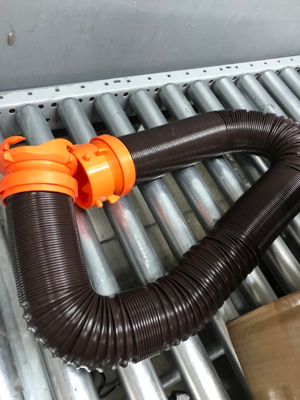 Photo 2 of *USED*Camco 20' (39742) RhinoFLEX 20-Foot RV Sewer Hose Kit, Swivel Transparent Elbow with 4-in-1 Dump Station Fitting-Storage Caps Included , Black , Brown 20ft Sewer Hose Kit Frustration-Free Packaging