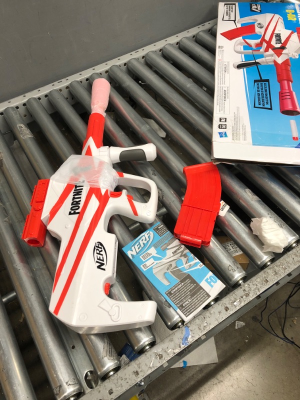 Photo 1 of *USED*NERF Fortnite B-AR Motorized Dart Blaster -- Fortnite Converge Wrap, Motorized 10-Dart Blasting, 10-Dart Clip, 10 Official Elite Darts
