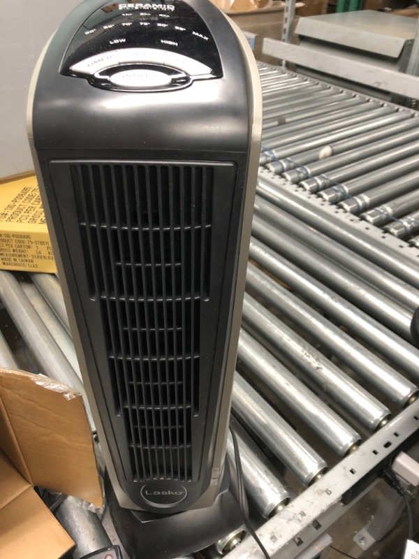 Photo 2 of *** POWERS ON *** Lasko Oscillating Ceramic Tower Space Heater for Home with Adjustable Thermostat, Timer and Remote Control, 22.5 Inches, Grey/Black, 1500W, 751320