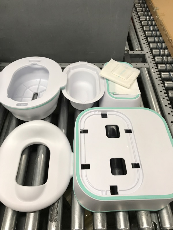 Photo 1 of Frida Baby All-in-One Potty Kit Includes Grow-with-Me Potty, Toilet Topper, Toilet Step Stool, Sink Step Stool, Cleanup Essentials, and Professional Potty Guide