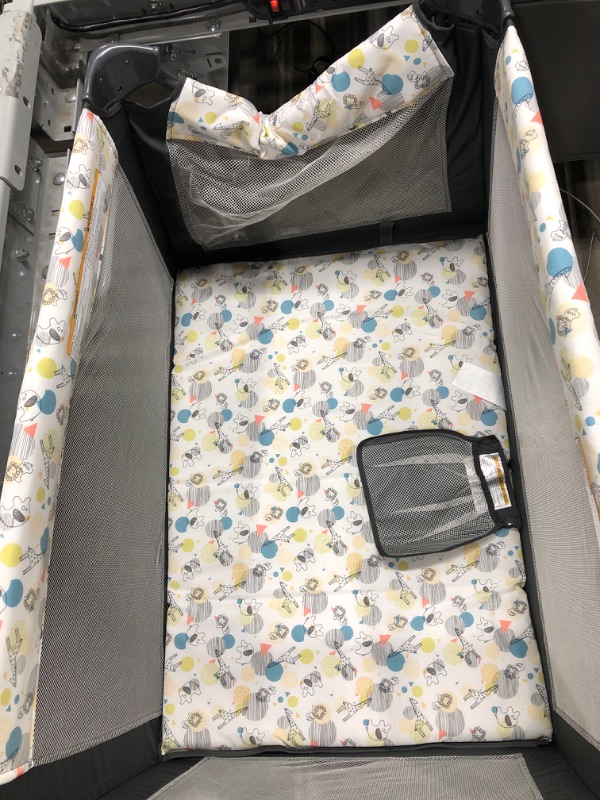 Photo 2 of ***** One end will not lock open****
Pack and play portable playard