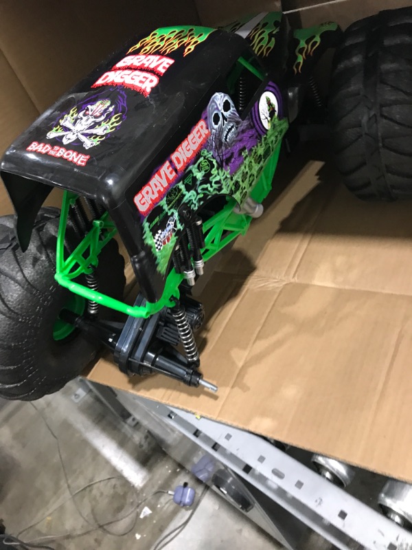 Photo 3 of damaged 
Monster Jam, Official Mega Grave Digger All-Terrain Remote Control Monster Truck with Lights, 1: 6 Scale, Kids Toys for Boys