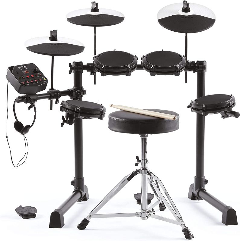 Photo 1 of Alesis Drums Debut Kit – Kids Drum Set With 4 Quiet Mesh Electric Drum Pads, 120 Sounds, Drum Stool, Drum Sticks, Headphones and 60 Melodics Lessons
