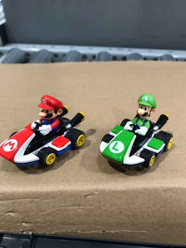 Photo 3 of Carrera GO!!! 63503 Official Licensed Mario Kart Battery Operated 1:43 Scale Slot Car Racing Toy Track Set with Jump Ramp Featuring Mario and Luigi for Kids Ages 5 Years and Up
