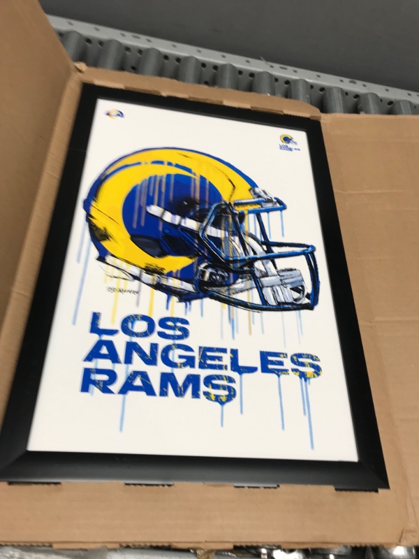 Photo 3 of **BREAK IN FRAME***
Trends International NFL Los Angeles Rams - Drip Helmet 20 Wall Poster, 14.725" x 22.375", Black Framed Version 14.725" x 22.375" Black Framed Version