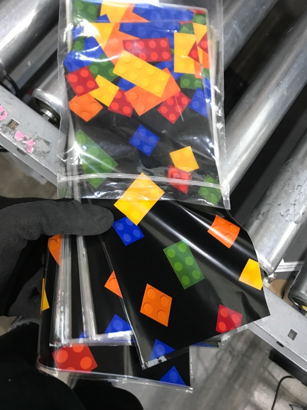 Photo 1 of 100 Pcs Building Block Cellophane Treat Bags, Color Bricks Theme Building Block Candy Goodie Bags Plastic Party Favor Bags with 100 Silver Twist Ties for Birthday Party Supplies (Black Background)
