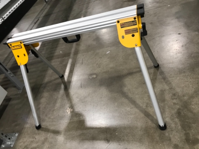 Photo 1 of **HARDWARE INCOMPLETE***
DEWALT Miter Saw Stand, Compact (DWX724) & Miter Saw Crown Stops (DW7084)