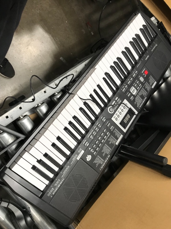 Photo 2 of *ALL KEYS ARE BROKEN***
Starfavor 61 Key Portable Electric Keyboard Electronic Piano Music for Beginners Adults Kids, include Z-style Stand, Stool, Power Supply, Microphone, Headphone (SEK-461S)