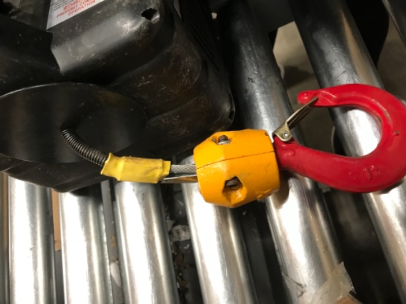 Photo 7 of **SMALL CRACK, BUTTON IS LOOSE BUT FUNCTIONAL, MISSING CONTROLLER**
***
NEWTRY 3 in 1 Electric Hoist Winch 1,100lb Wireless Remote Control, Cable Remote Control, 110/120 Volt Portable Power Electric Hoist, Vertically & Horizontally, Lift 16ft/min 1100lb, 